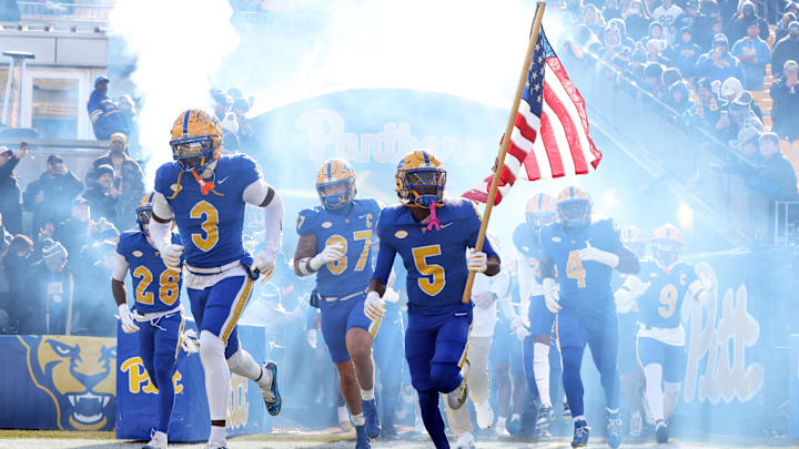 Nov 29, 2025; Pittsburgh, Pennsylvania, USA; Pittsburgh Panthers linebacker Rasheem Biles (3) and wide receiver Raphael Williams Jr. (5) lead the team onto the field to play the Miami Hurricanes at Acrisure Stadium. Mandatory Credit: Charles LeClaire-Imagn Images Nov 29, 2025; Pittsburgh, Pennsylvania, USA; Pittsburgh Panthers linebacker Rasheem Biles (3) and wide receiver Raphael Williams Jr. (5) lead the team onto the field to play the Miami Hurricanes at Acrisure Stadium. Mandatory Credit: Charles LeClaire-Imagn Images
