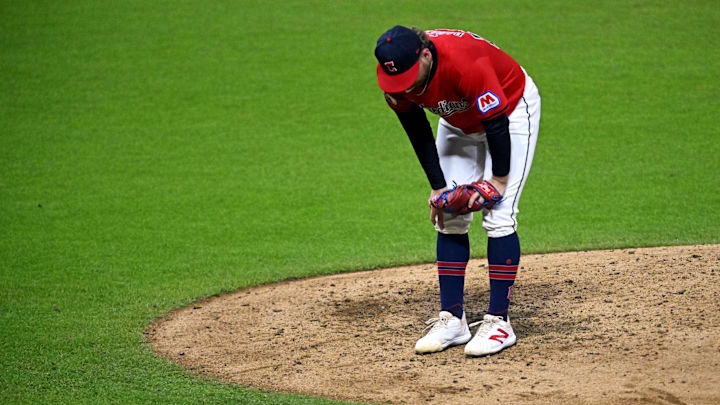 Cleveland, Ohio, USA; Cleveland Guardians pitcher Tanner Bibee (28) reacts after an apparent injury during the sixth inning against the New York Yankees during Game 5 of the ALCS for the 2024 MLB playoffs at Progressive Field.