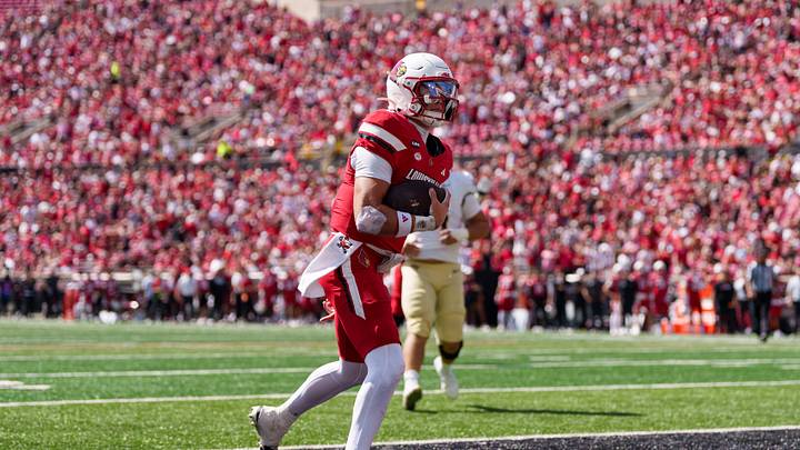 Sep 26, 2026; Louisville, Kentucky, USA;  Louisville Cardinals quarterback Lincoln Kienholz (3) celebrates after scoring a touchdown against the Wake Forest Demon Deacons at L&N Federal Credit Union Stadium.  Mandatory Credit: Chris Carter-Imagn Images
