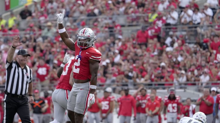 August 31, 2024; Columbus, Ohio, USA;
Ohio State Buckeyes safety Caleb Downs (2) celebrates after sacking Akron Zips quarterback Ben Finley (10) during the first half of Saturday’s NCAA Division I football game at Ohio Stadium.