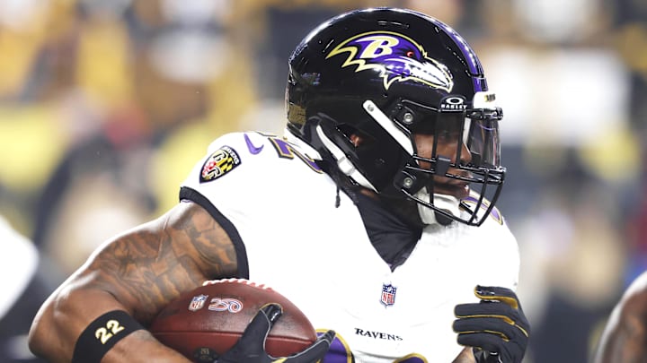 Jan 4, 2026; Pittsburgh, Pennsylvania, USA;  Baltimore Ravens running back Derrick Henry (22) carries the ball against the Pittsburgh Steelers during the first quarter at Acrisure Stadium. 