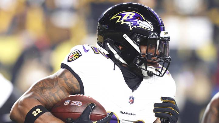 Baltimore Ravens running back Derrick Henry (22) carries the ball against the Pittsburgh Steelers during the first quarter at Acrisure Stadium. 