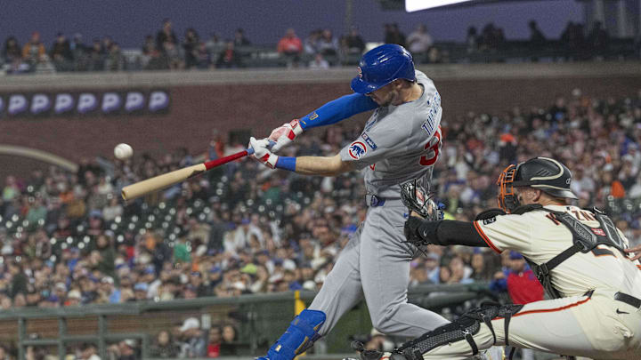 Aug 27, 2025; San Francisco, California, USA;  Chicago Cubs outfielder Kyle Tucker (30) hits a single during the fourth inning against the San Francisco Giants at Oracle Park. Mandatory Credit: Stan Szeto-Imagn Images