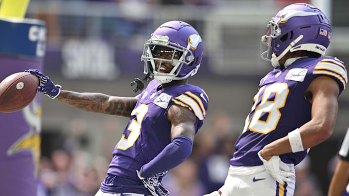 Sep 10, 2023; Minneapolis, Minnesota, USA; Minnesota Vikings wide receiver Jordan Addison (3) reacts with wide receiver Justin Jefferson (18) after scoring his first career touchdown pass from quarterback Kirk Cousins (not pictured) against the Tampa Bay Buccaneers during the second quarter at U.S. Bank Stadium. Mandatory Credit: Jeffrey Becker-USA TODAY Sports