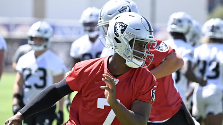 Jun 10, 2025; Henderson, NV, USA; Las Vegas Raiders quarterback Geno Smith (7) performs a drill during Las Vegas Raiders Minicamp at Intermountain Health Performance Center. Mandatory Credit: Candice Ward-Imagn Images