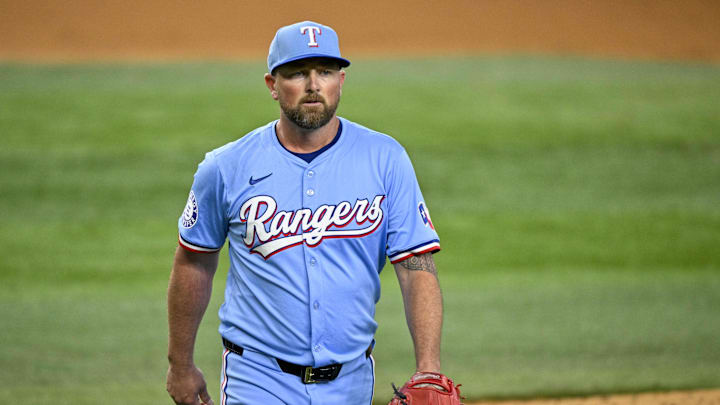 Sep 22, 2024; Arlington, Texas, USA; Texas Rangers relief pitcher Kirby Yates (39) walks off the field after he pitches against the Seattle Mariners during the ninth inning at Globe Life Field. Mandatory Credit: Jerome Miron-Imagn Images