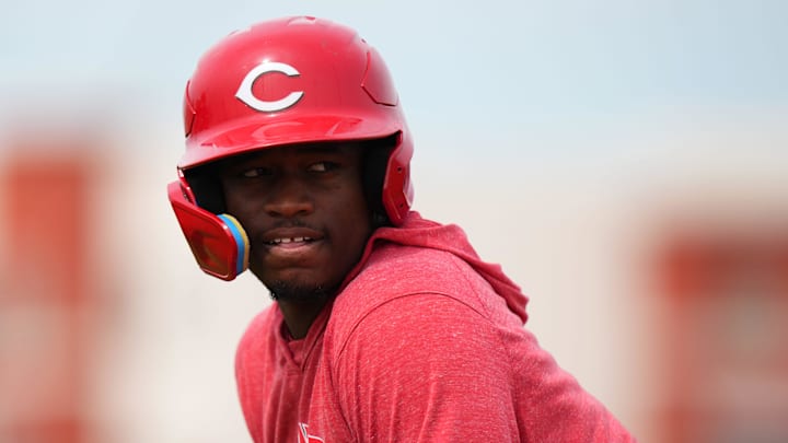 Cincinnati Reds minor league player Cam Collier serves as a baserunner during rundown drills during spring training workouts, Friday, Feb. 23, 2024, at the team   s spring training facility in Goodyear, Ariz.
