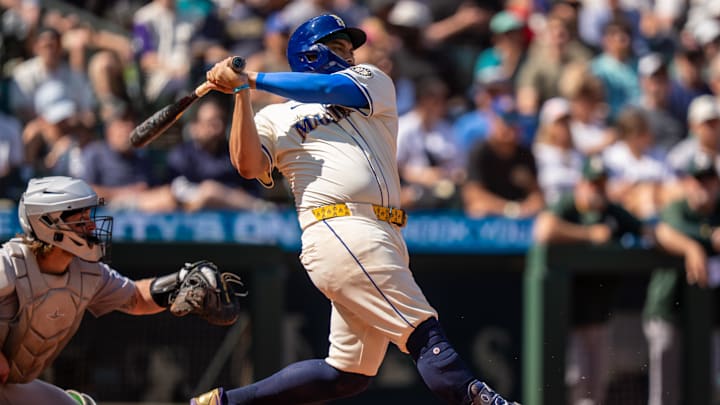 Aug 24, 2025; Seattle, Washington, USA; Seattle Mariners first baseman Josh Naylor (12) hits a two-run double during the third inning against the Athletics at T-Mobile Park. Mandatory Credit: Stephen Brashear-Imagn Images Aug 24, 2025; Seattle, Washington, USA; Seattle Mariners first baseman Josh Naylor (12) hits a two-run double during the third inning against the Athletics at T-Mobile Park. Mandatory Credit: Stephen Brashear-Imagn Images