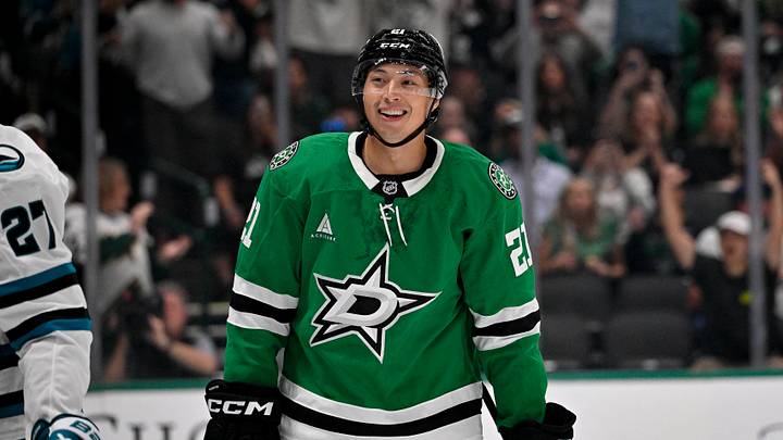 Oct 5, 2026; Dallas, Texas, USA; Dallas Stars left wing Jason Robertson (21) celebrates a goal scored by left wing Jamie Benn (not pictured) against the San Jose Sharks during the second period at the American Airlines Center. Mandatory Credit: Jerome Miron-Imagn Images