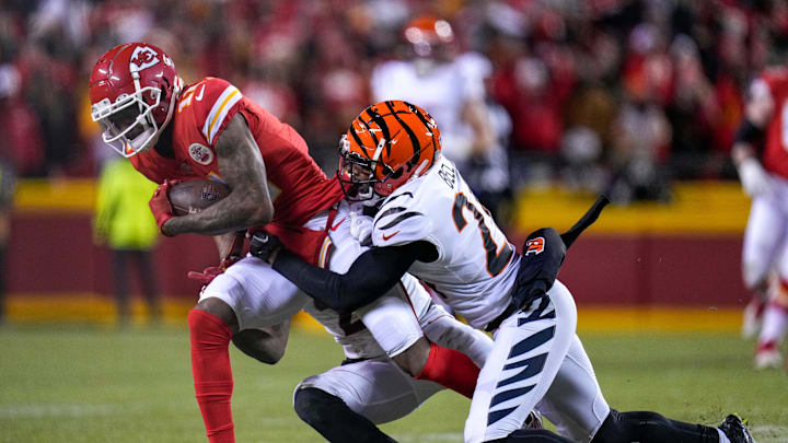 Kansas City Chiefs wide receiver Marquez Valdes-Scantling (11) is pulled down by Cincinnati Bengals