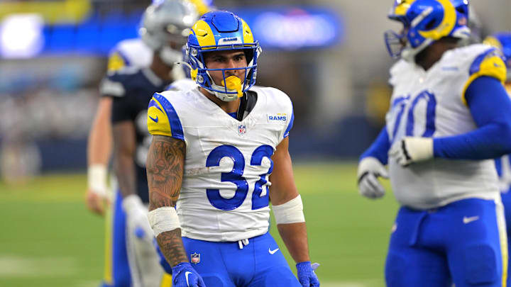 Aug 9, 2025; Inglewood, California, USA;  Los Angeles Rams running back Cody Schrader (32) reacts after a first down during the second half against the Dallas Cowboys at SoFi Stadium. Mandatory Credit: Jayne Kamin-Oncea-Imagn Images