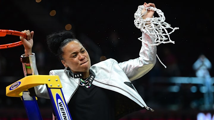 South Carolina basketball coach Dawn Staley after cutting down the nets following her third National Championship
