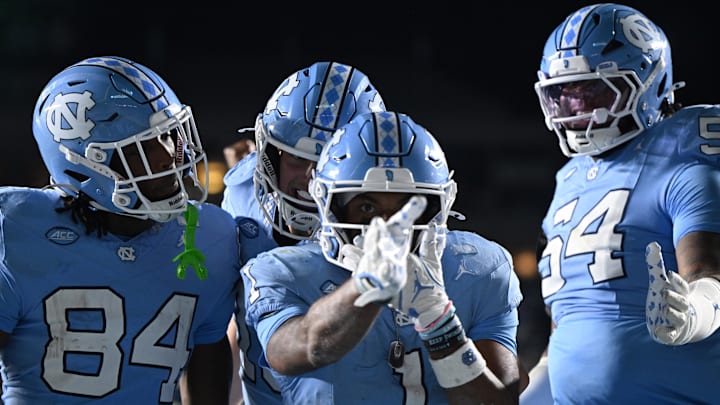 Nov 22, 2025; Chapel Hill, North Carolina, USA; North Carolina Tar Heels wide receiver Jordan Shipp (1) celebrates after a touchdown during the second half at Kenan Stadium. Mandatory Credit: William Howard-Imagn Images