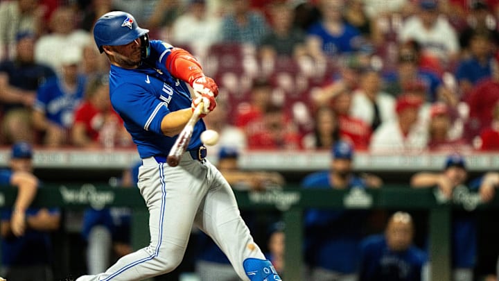 Toronto Blue Jays first baseman Ty France (2) hits a base hit in the eighth inning between the Cincinnati Reds and Toronto Blue Jays at Great American Ball Park in Cincinnati on Sept. 3, 2025.