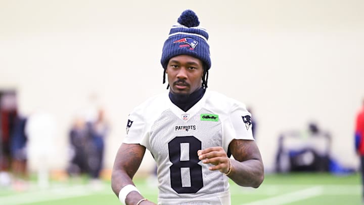 Jun 10, 2025; Foxborough, MA, USA; New England Patriots wide receiver Stefon Diggs (8) walks to the podium to speak to the media after minicamp held in the WIN Field House at Gillette Stadium. Mandatory Credit: Eric Canha-Imagn Images Jun 10, 2025; Foxborough, MA, USA; New England Patriots wide receiver Stefon Diggs (8) walks to the podium to speak to the media after minicamp held in the WIN Field House at Gillette Stadium. Mandatory Credit: Eric Canha-Imagn Images