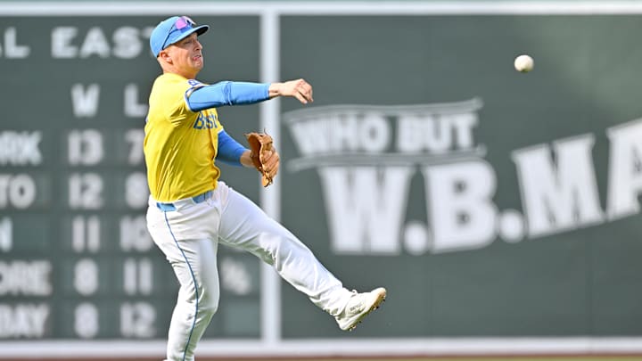 Apr 19, 2025; Boston, Massachusetts, USA; Boston Red Sox third baseman Alex Bregman (2) throws to first base for an out against the Chicago White Sox during the first inning at Fenway Park. Mandatory Credit: Eric Canha-Imagn Images