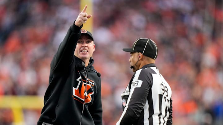 Bengals head coach Zac Taylor shouts at an official as a replay runs on the video board in the first quarter against the Broncos at Paycor Stadium on Saturday, Dec. 28, 2024.