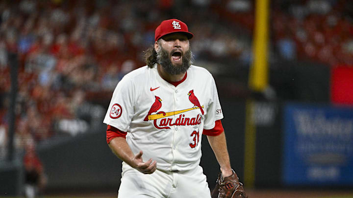 Sep 17, 2024; St. Louis, Missouri, USA;  St. Louis Cardinals starting pitcher Lance Lynn (31) reacts after inning ending double play against the Pittsburgh Pirates during the fifth inning at Busch Stadium. Mandatory Credit: Jeff Curry-Imagn Images