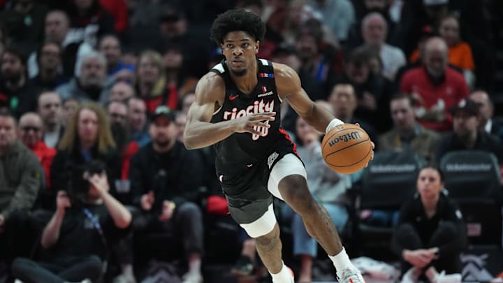 Mar 12, 2025; Portland, Oregon, USA; Portland Trail Blazers guard Scoot Henderson (00) dribbles the ball during the first half against the New York Knicks at Moda Center. Mandatory Credit: Soobum Im-Imagn Images