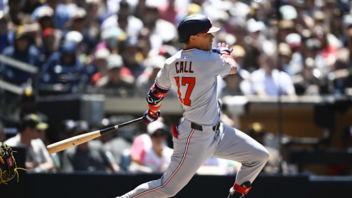 Jun 25, 2025; San Diego, California, USA; Washington Nationals left fielder Alex Call (17) hits a single during the fifth inning against the San Diego Padres at Petco Park. 