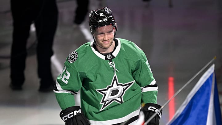 Feb 4, 2026; Dallas, Texas, USA; Dallas Stars center Radek Faksa (12) takes the ice as the Stars celebrate their 2026 Winter Olympics hockey players before the game against the St. Louis Blues at the American Airlines Center. Mandatory Credit: Jerome Miron-Imagn Images