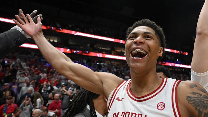 Mar 15, 2026; Nashville, TN, USA; Arkansas Razorbacks guard Meleek Thomas (1) celebrates after the men's SEC Conference Tournament Championship against the Vanderbilt Commodores at Bridgestone Arena. Mandatory Credit: Steve Roberts-Imagn Images