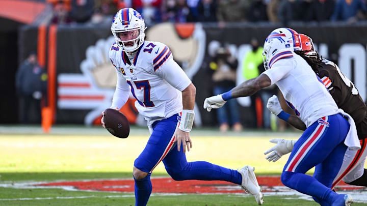 Dec 21, 2025; Cleveland, Ohio, USA;  Buffalo Bills quarterback Josh Allen (17) rolls out against the Cleveland Browns during the first half at Huntington Bank Field. 