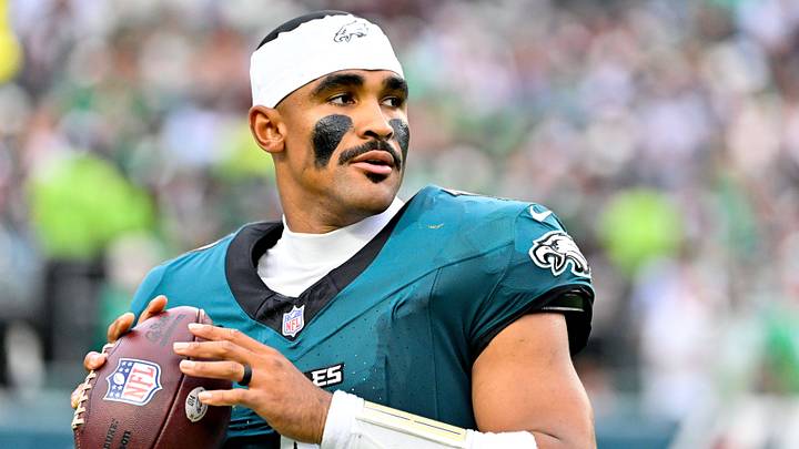 Philadelphia Eagles quarterback Jalen Hurts (1) stays loose during a TV timeout during the first half against the Washington Commanders at Lincoln Financial Field. Philadelphia Eagles quarterback Jalen Hurts (1) stays loose during a TV timeout during the first half against the Washington Commanders at Lincoln Financial Field.