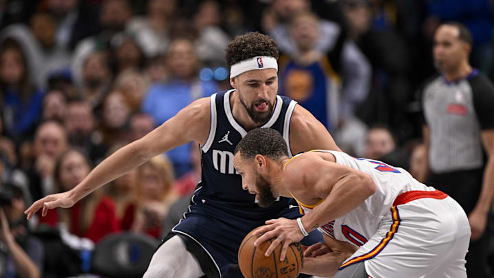 Feb 12, 2025; Dallas, Texas, USA; Dallas Mavericks guard Klay Thompson (31) and Golden State Warriors guard Stephen Curry (30) in action during the game between the Dallas Mavericks and the Golden State Warriors at the American Airlines Center. Mandatory Credit: Jerome Miron-Imagn Images