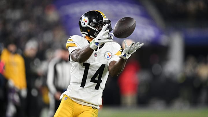 Pittsburgh Steelers wide receiver George Pickens (14) makes a catch against the Baltimore Ravens in the third quarter in an AFC wild card game at M&T Bank Stadium. Pittsburgh Steelers wide receiver George Pickens (14) makes a catch against the Baltimore Ravens in the third quarter in an AFC wild card game at M&T Bank Stadium.