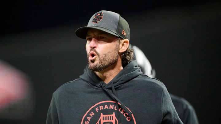 May 9, 2026; San Francisco, California, USA; San Francisco Giants manager Tony Vitello (23) reacts after infielder Christian Koss (50) was hit in the head with a pitch thrown by pitcher Cam Sanders (not pictured) during the ninth inning at Oracle Park. Mandatory Credit: Robert Edwards-Imagn Images