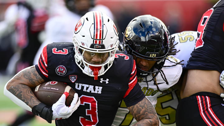 Nov 25, 2023; Salt Lake City, Utah, USA; Utah Utes running back Ja'Quinden Jackson (3) gets tackled