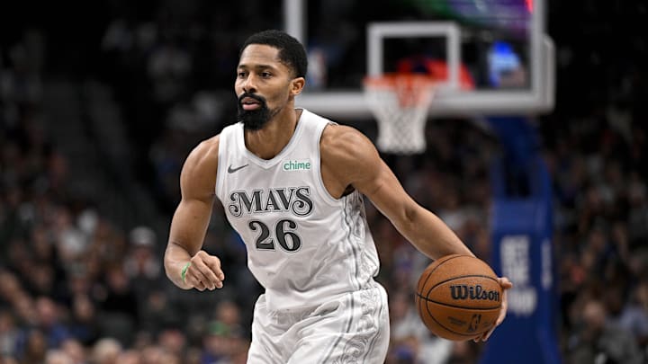 Nov 27, 2024; Dallas, Texas, USA; Dallas Mavericks guard Spencer Dinwiddie (26) brings the ball up court against the New York Knicks during the second quarter at the American Airlines Center. Mandatory Credit: Jerome Miron-Imagn Images