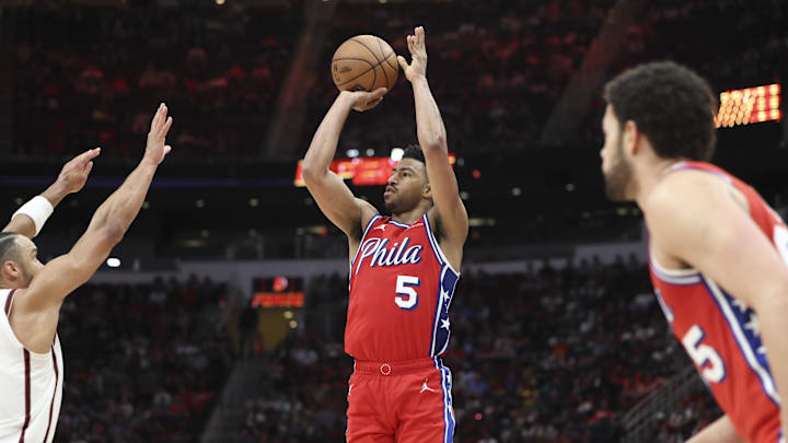 Mar 17, 2025; Houston, Texas, USA; Philadelphia 76ers guard Quentin Grimes (5) shoots the ball during the fourth quarter against the Houston Rockets at Toyota Center. Mandatory Credit: Troy Taormina-Imagn Images