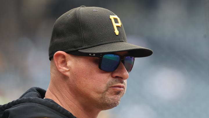 Sep 7, 2025; Pittsburgh, Pennsylvania, USA;  Pittsburgh Pirates manager Don Kelly (12) looks on from the dugout against the Milwaukee Brewers during the first inning at PNC Park. Mandatory Credit: Charles LeClaire-Imagn Images