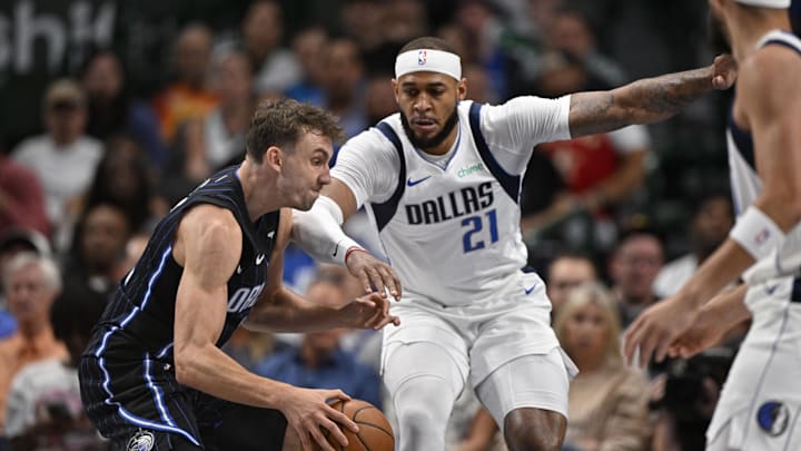 Nov 3, 2024; Dallas, Texas, USA; Orlando Magic forward Franz Wagner (22) looks to move the ball past Dallas Mavericks center Daniel Gafford (21) during the first quarter at American Airlines Center. Mandatory Credit: Jerome Miron-Imagn Images Nov 3, 2024; Dallas, Texas, USA; Orlando Magic forward Franz Wagner (22) looks to move the ball past Dallas Mavericks center Daniel Gafford (21) during the first quarter at American Airlines Center. Mandatory Credit: Jerome Miron-Imagn Images
