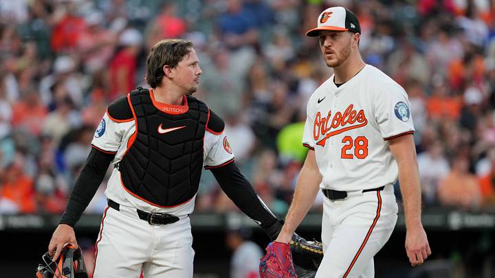 Aug 13, 2024; Baltimore, Maryland, USA; Baltimore Orioles pitcher Trevor Rogers (28) greeted by catcher Adley Rutschman (35) after the fourth inning against the Washington Nationals at Oriole Park at Camden Yards. Mandatory Credit: Mitch Stringer-USA TODAY Sports