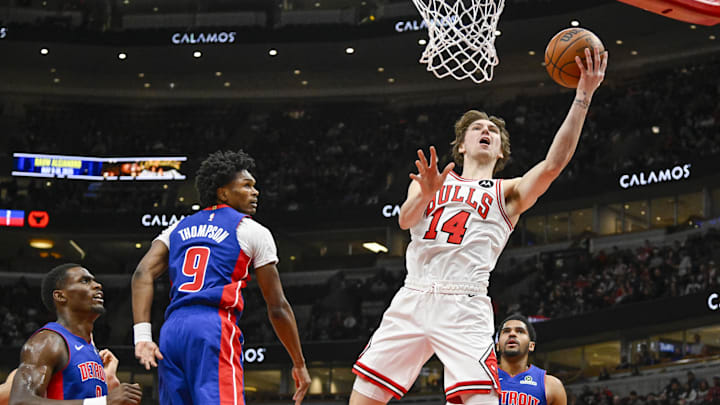 Feb 12, 2025; Chicago, Illinois, USA;  Chicago Bulls forward Matas Buzelis (14) shoots against  Detroit Pistons forward Ausar Thompson (9) during the first half at the United Center. Mandatory Credit: Matt Marton-Imagn Images