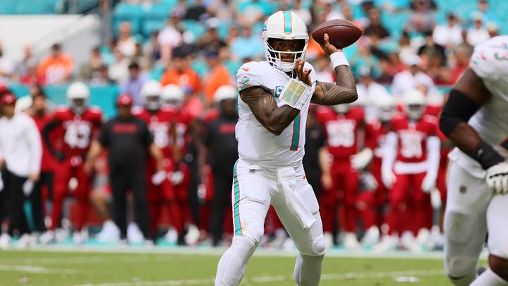 Oct 27, 2024; Miami Gardens, Florida, USA; Miami Dolphins quarterback Tua Tagovailoa (1) throws the football against the Arizona Cardinals during the first quarter at Hard Rock Stadium. 