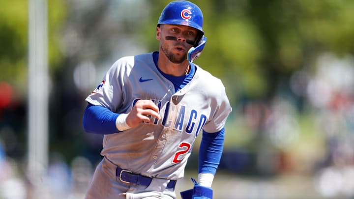 Apr 2, 2025; West Sacramento, California, USA; Chicago Cubs second base Nico Hoerner (2) scores a run on a single by outfielder Pete Crow-Armstrong (4) during the fourth inning against the Athletics at Sutter Health Park.