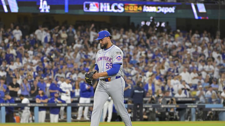 Oct 20, 2024; Los Angeles, California, USA; New York Mets pitcher Sean Manaea (59) walks to the dugout after being relieved in the third inning against the Los Angeles Dodgers during game six of the NLCS for the 2024 MLB playoffs at Dodger Stadium. Oct 20, 2024; Los Angeles, California, USA; New York Mets pitcher Sean Manaea (59) walks to the dugout after being relieved in the third inning against the Los Angeles Dodgers during game six of the NLCS for the 2024 MLB playoffs at Dodger Stadium.