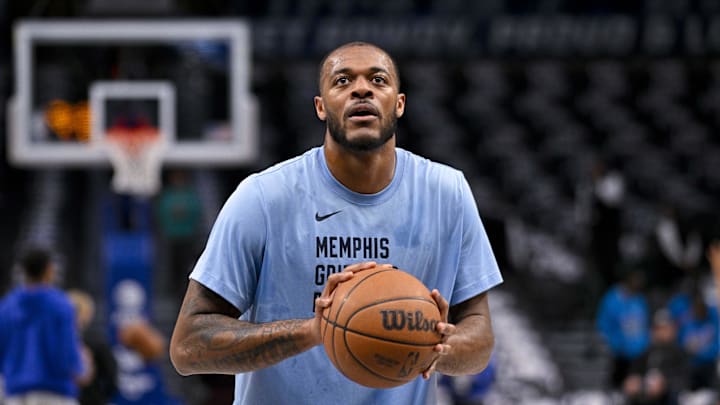 Jan 9, 2024; Dallas, Texas, USA; Memphis Grizzlies forward Xavier Tillman (2) warms up before the