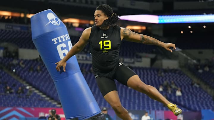 Feb 27, 2025; Indianapolis, IN, USA; Georgia defensive lineman Tyrion Ingram-Dawkins (DL19) participates in drills during the 2025 NFL Combine at Lucas Oil Stadium. 