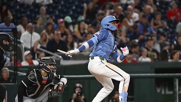 Sep 26, 2025; Washington, District of Columbia, USA; Washington Nationals shortstop CJ Abrams (5) singles against the Chicago White Sox during the fourth inning at Nationals Park. Mandatory Credit: Brad Mills-Imagn Images