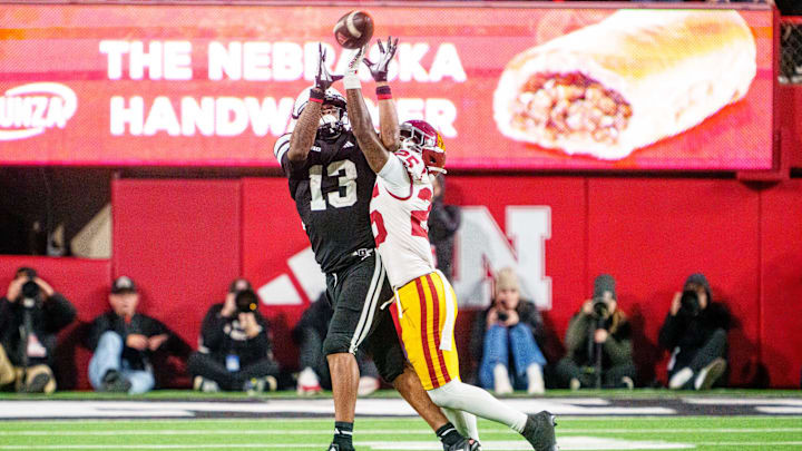 Nov 1, 2025; Lincoln, Nebraska, USA; Southern California Trojans cornerback Marcelles Williams (25) breaks up a pass to Nebraska Cornhuskers wide receiver Nyziah Hunter (13) during the fourth quarter at Memorial Stadium. 