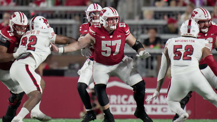 Wisconsin offensive lineman Jake Renfro (57) provides pass protection during the second quarter of their game against Miami (Ohio) Thursday, August 28, 2025 at Camp Randall Stadium in Madison, Wisconsin. Wisconsin offensive lineman Jake Renfro (57) provides pass protection during the second quarter of their game against Miami (Ohio) Thursday, August 28, 2025 at Camp Randall Stadium in Madison, Wisconsin.