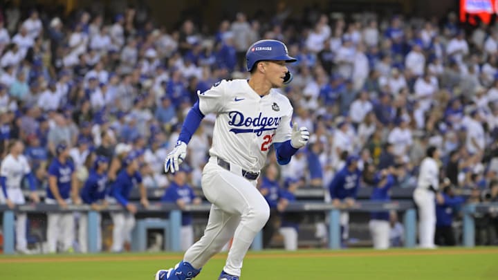 Oct 26, 2024; Los Angeles, California, USA; Los Angeles Dodgers shortstop Tommy Edman (25) runs after hitting a solo home run in the second inning against the New York Yankees during game two of the 2024 MLB World Series at Dodger Stadium. Mandatory Credit: Jayne Kamin-Oncea-Imagn Images Oct 26, 2024; Los Angeles, California, USA; Los Angeles Dodgers shortstop Tommy Edman (25) runs after hitting a solo home run in the second inning against the New York Yankees during game two of the 2024 MLB World Series at Dodger Stadium. Mandatory Credit: Jayne Kamin-Oncea-Imagn Images