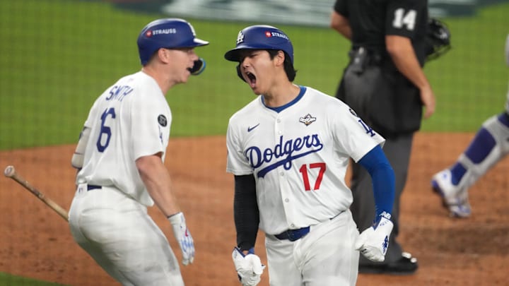 Los Angeles Dodgers two-way player Shohei Ohtani (17) celebrates scoring in the fifth inning against the Toronto Blue Jays during game three of the 2025 MLB World Series at Dodger Stadium on Monday. Los Angeles Dodgers two-way player Shohei Ohtani (17) celebrates scoring in the fifth inning against the Toronto Blue Jays during game three of the 2025 MLB World Series at Dodger Stadium on Monday.