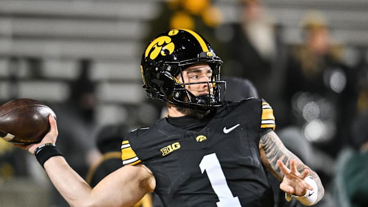 Nov 29, 2024; Iowa City, Iowa, USA; Iowa Hawkeyes quarterback Brendan Sullivan (1) warms up before the game against the Nebraska Cornhuskers at Kinnick Stadium. Mandatory Credit: Jeffrey Becker-Imagn Images Nov 29, 2024; Iowa City, Iowa, USA; Iowa Hawkeyes quarterback Brendan Sullivan (1) warms up before the game against the Nebraska Cornhuskers at Kinnick Stadium. Mandatory Credit: Jeffrey Becker-Imagn Images