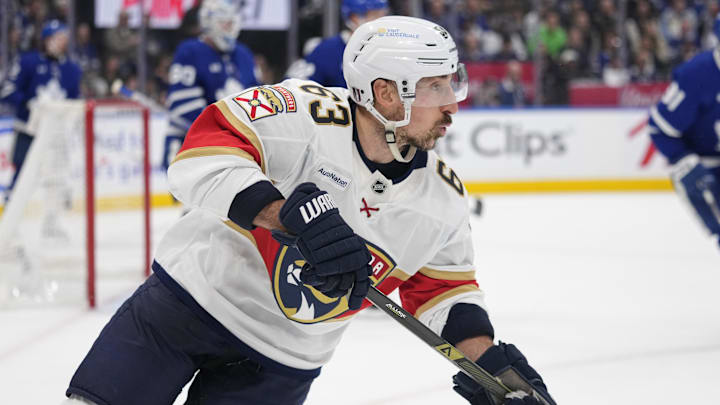 May 18, 2025; Toronto, Ontario, CAN; Florida Panthers forward Brad Marchand (63) skates against the Toronto Maple Leafs during the second period of game seven of the second round of the 2025 Stanley Cup Playoffs at Scotiabank Arena.